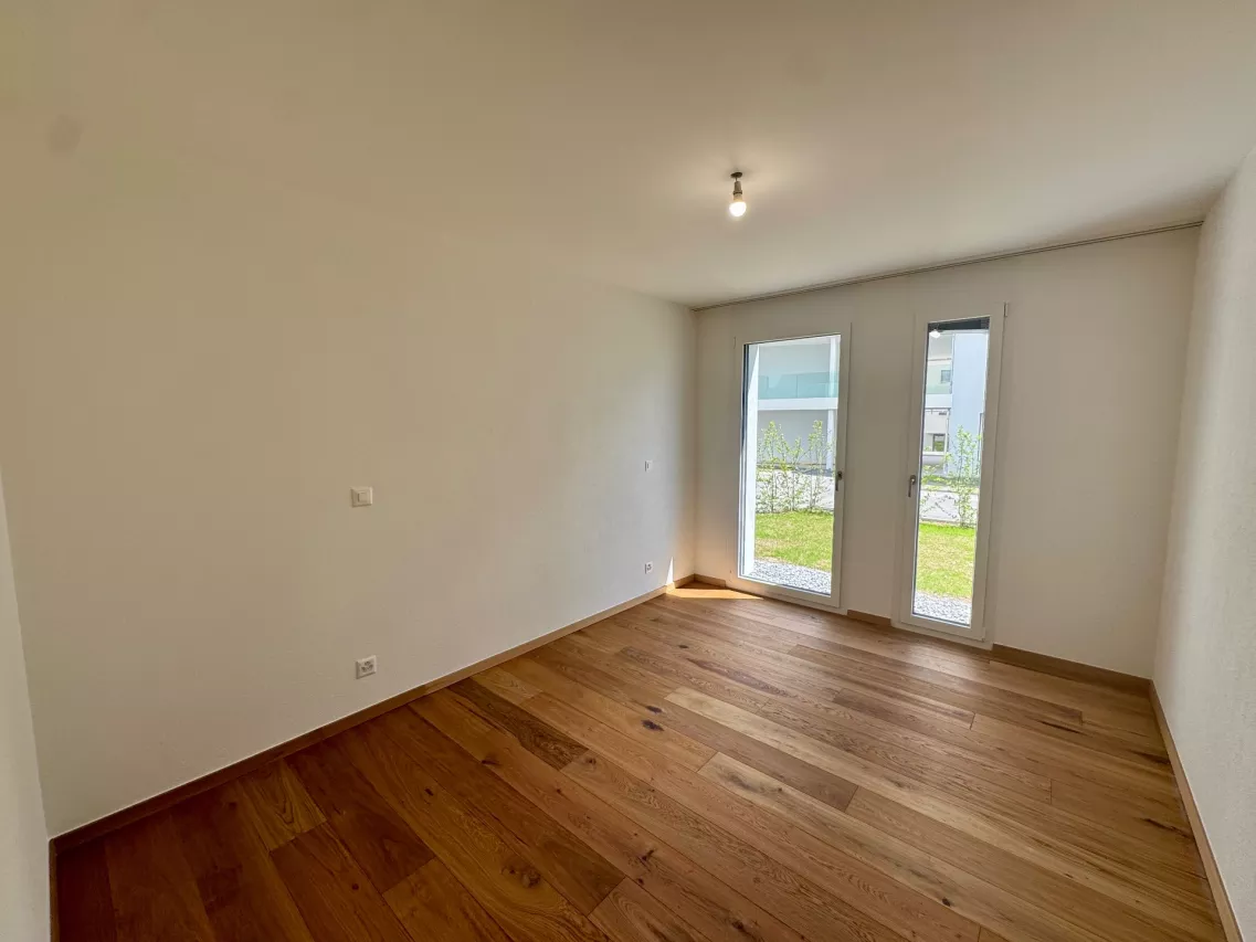 Appartement 2,5 pces neuf avec terrasse et jardin  
