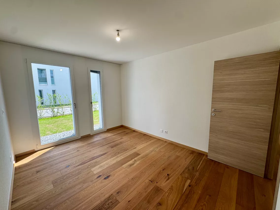 Appartement 2,5 pces neuf avec terrasse et jardin  