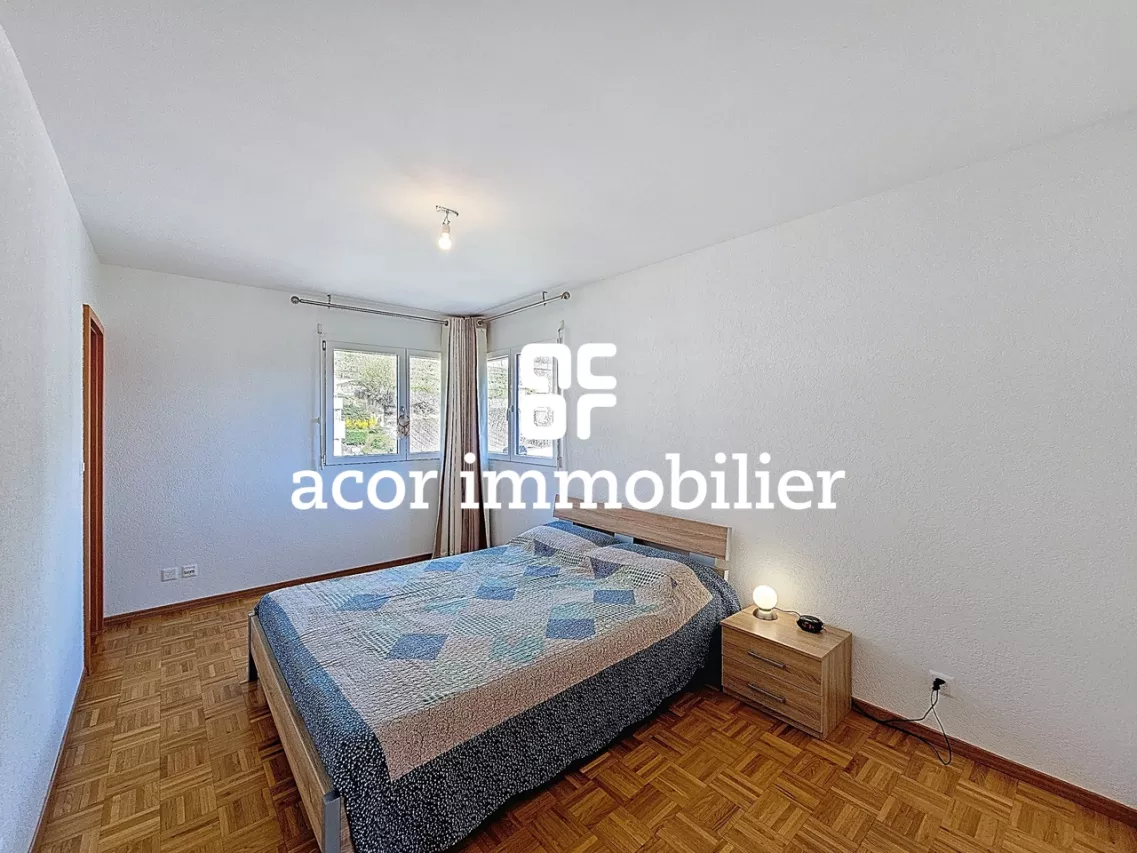 Appartement de 4½ p. au dernier étage proche du centre-ville