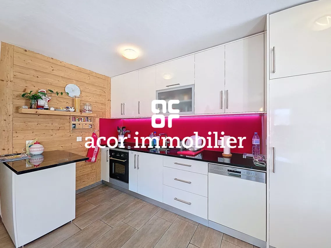 Appartement rénové de 4.5 pièces avec garage box