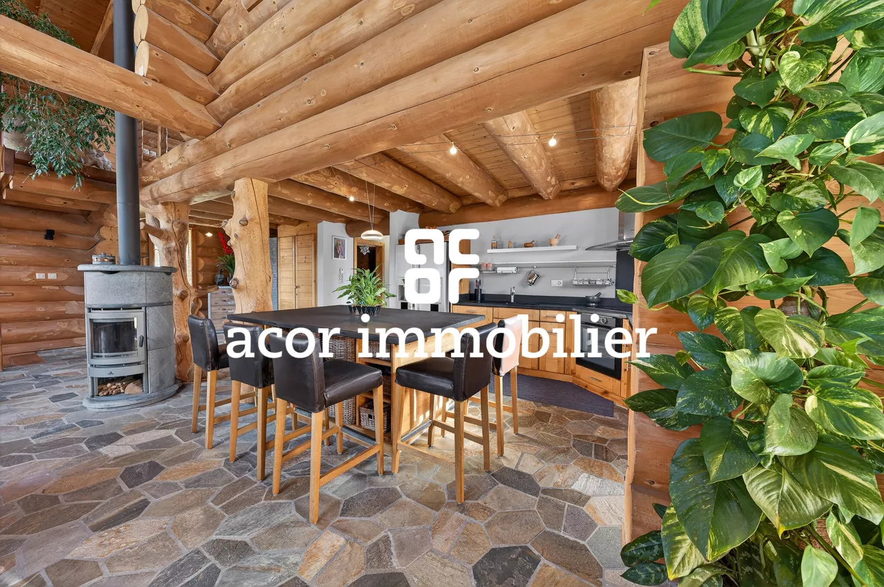 Villa en rondins de bois au style chalet canadien