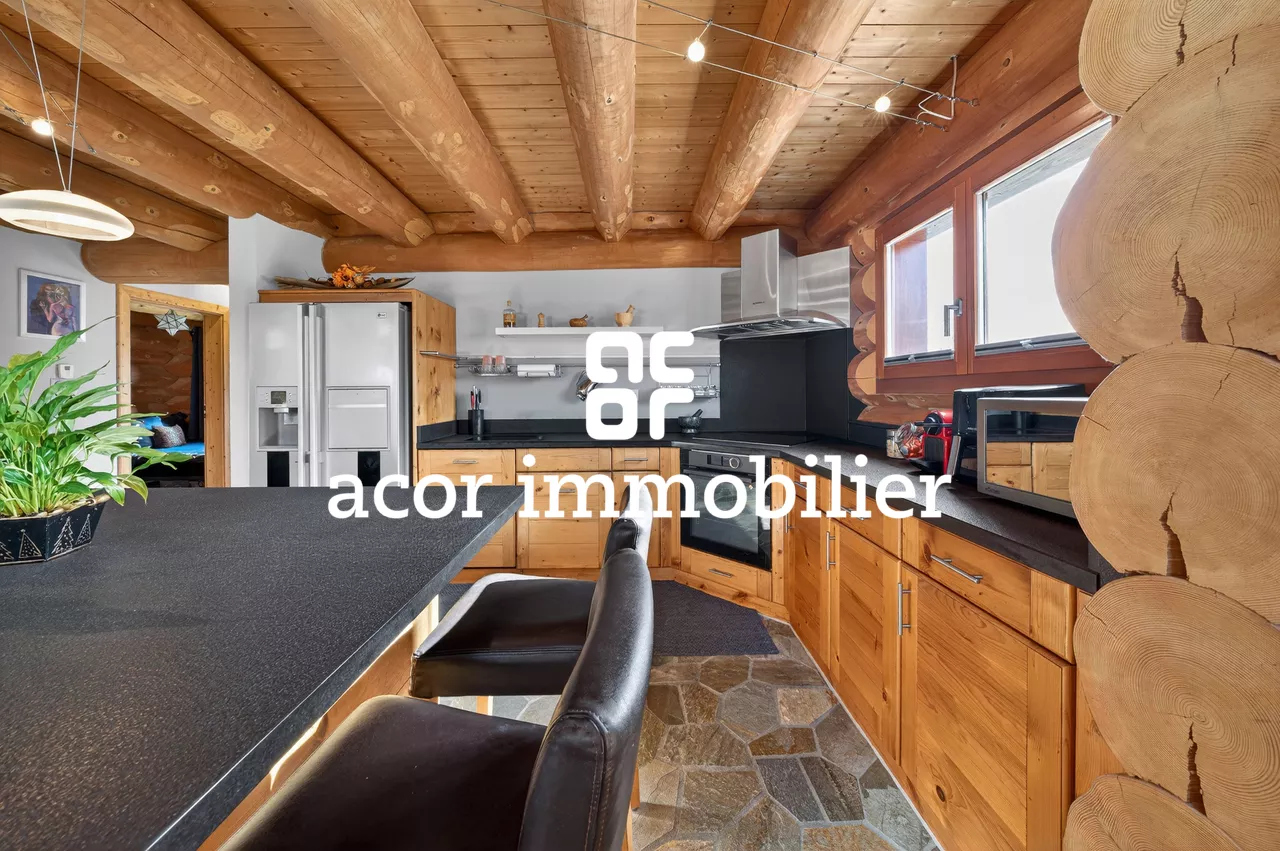 Villa en rondins de bois au style chalet canadien