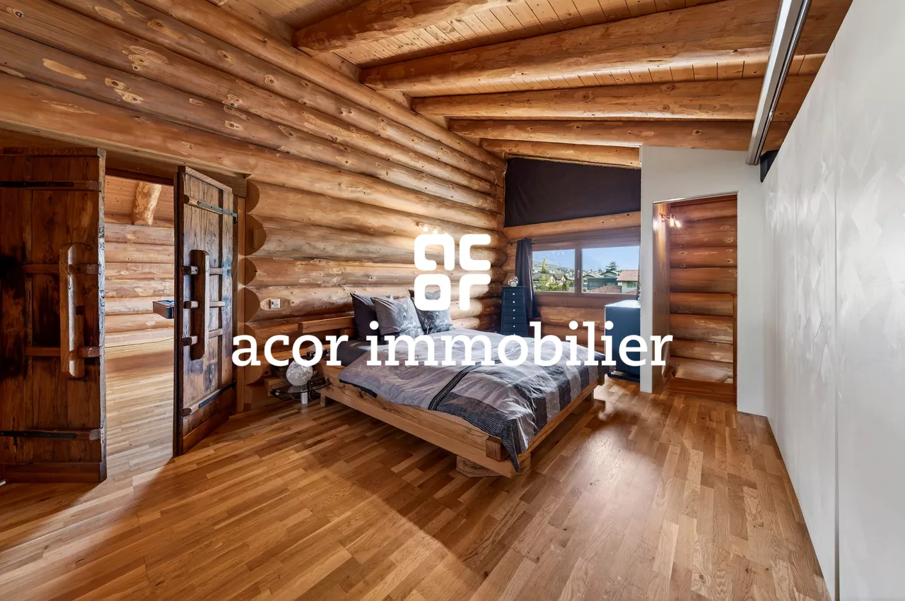 Villa en rondins de bois au style chalet canadien