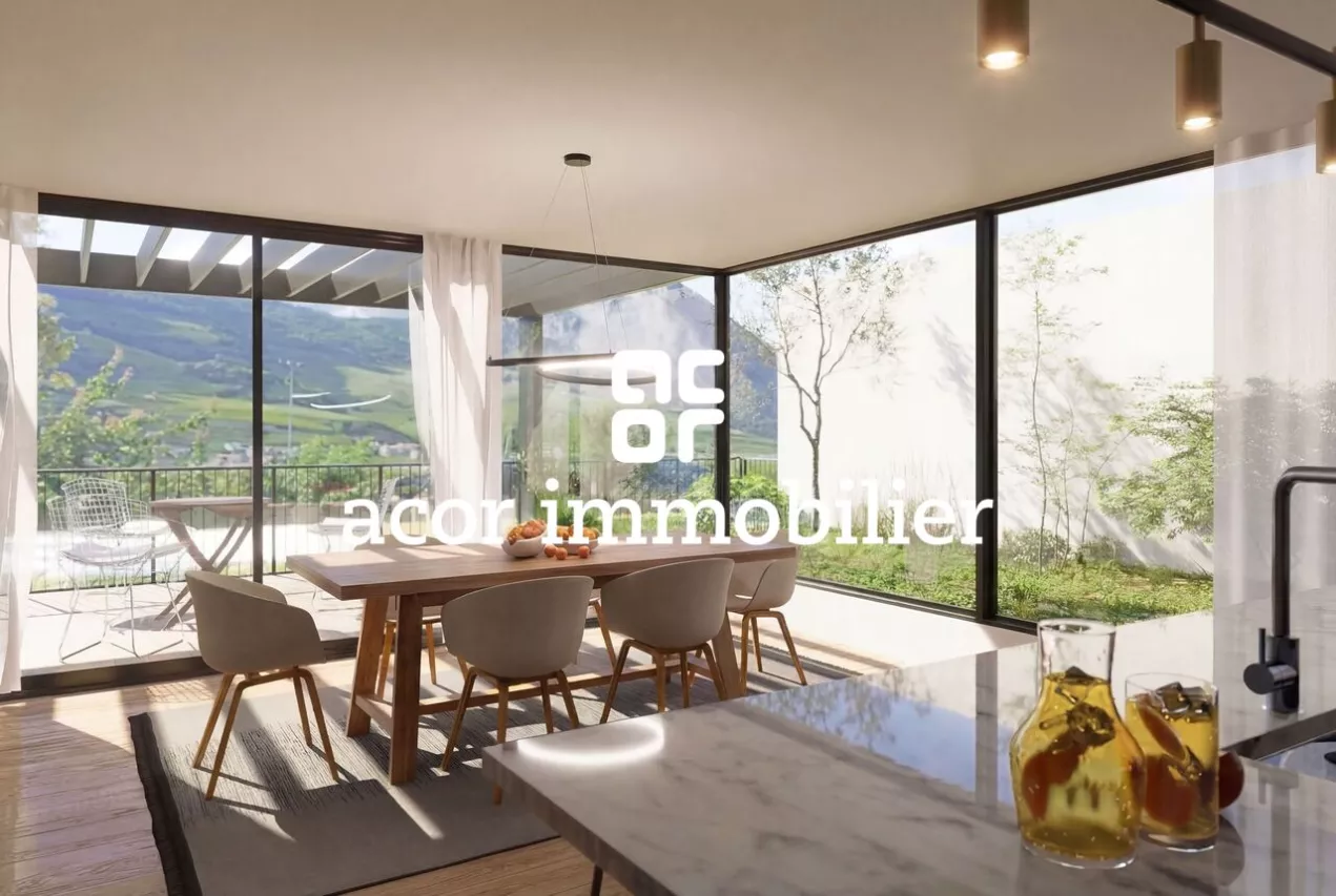 Appartement-villa 4,5 pces avec jardin et rooftop privatifs