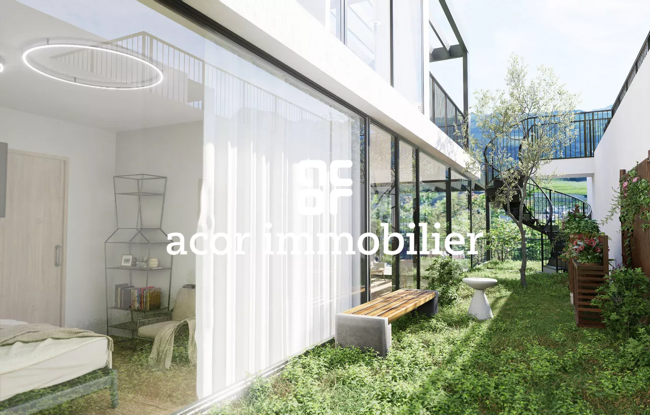 Appartement-villa 4,5 pces avec jardin et rooftop privatifs