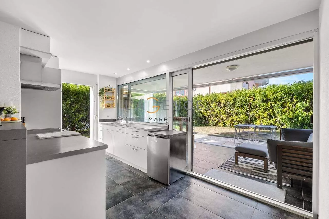 APPARTEMENT DE 3,5 PCES AVEC JARDIN D'HIVER ET PELOUSE DE 80M2