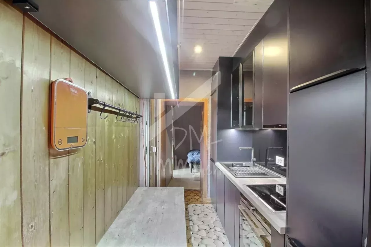 Appartement 2,5 P rénové, grande terrasse sud et véranda