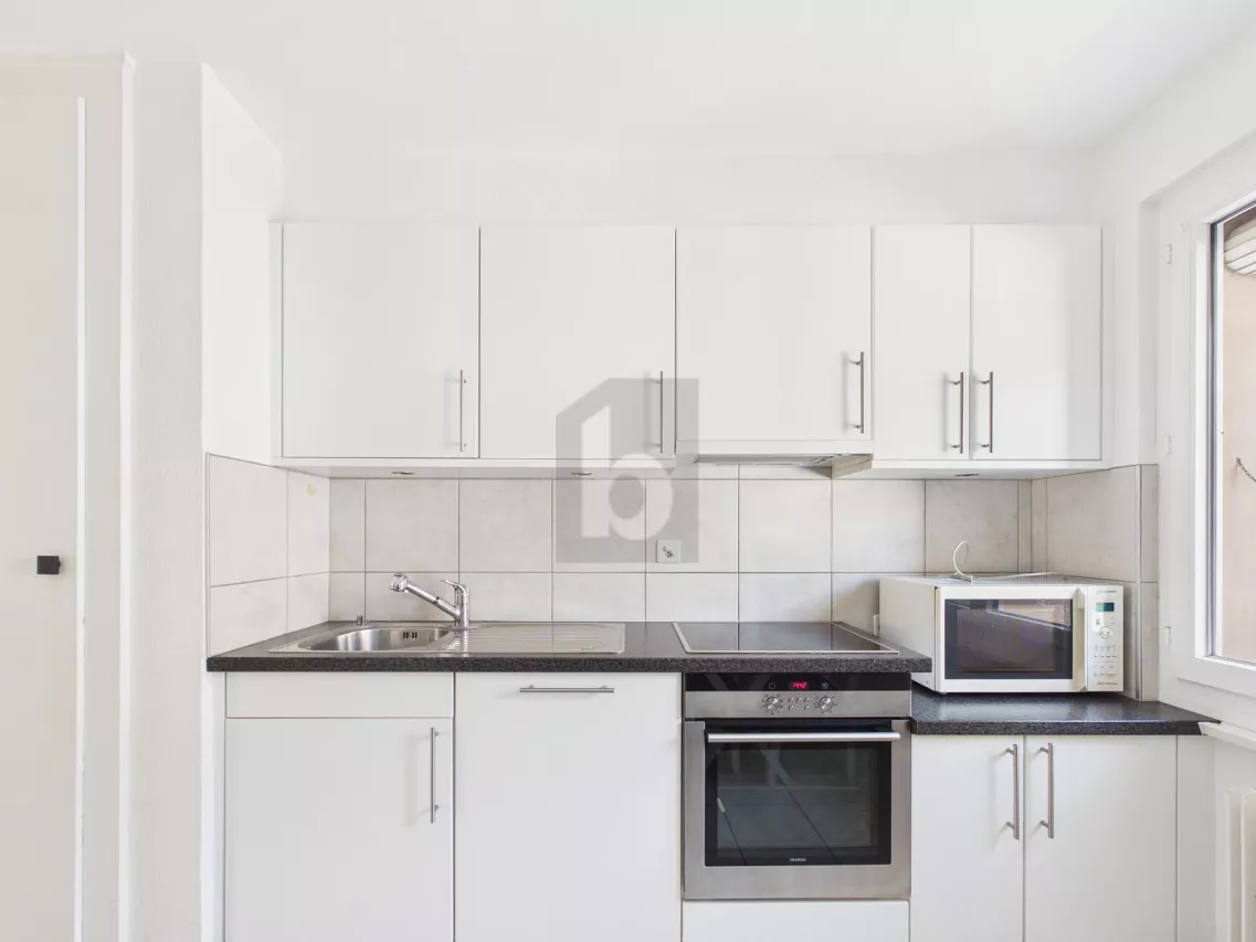 DANS UN QUARTIER ACTIVEMENT RECHERCHÉ