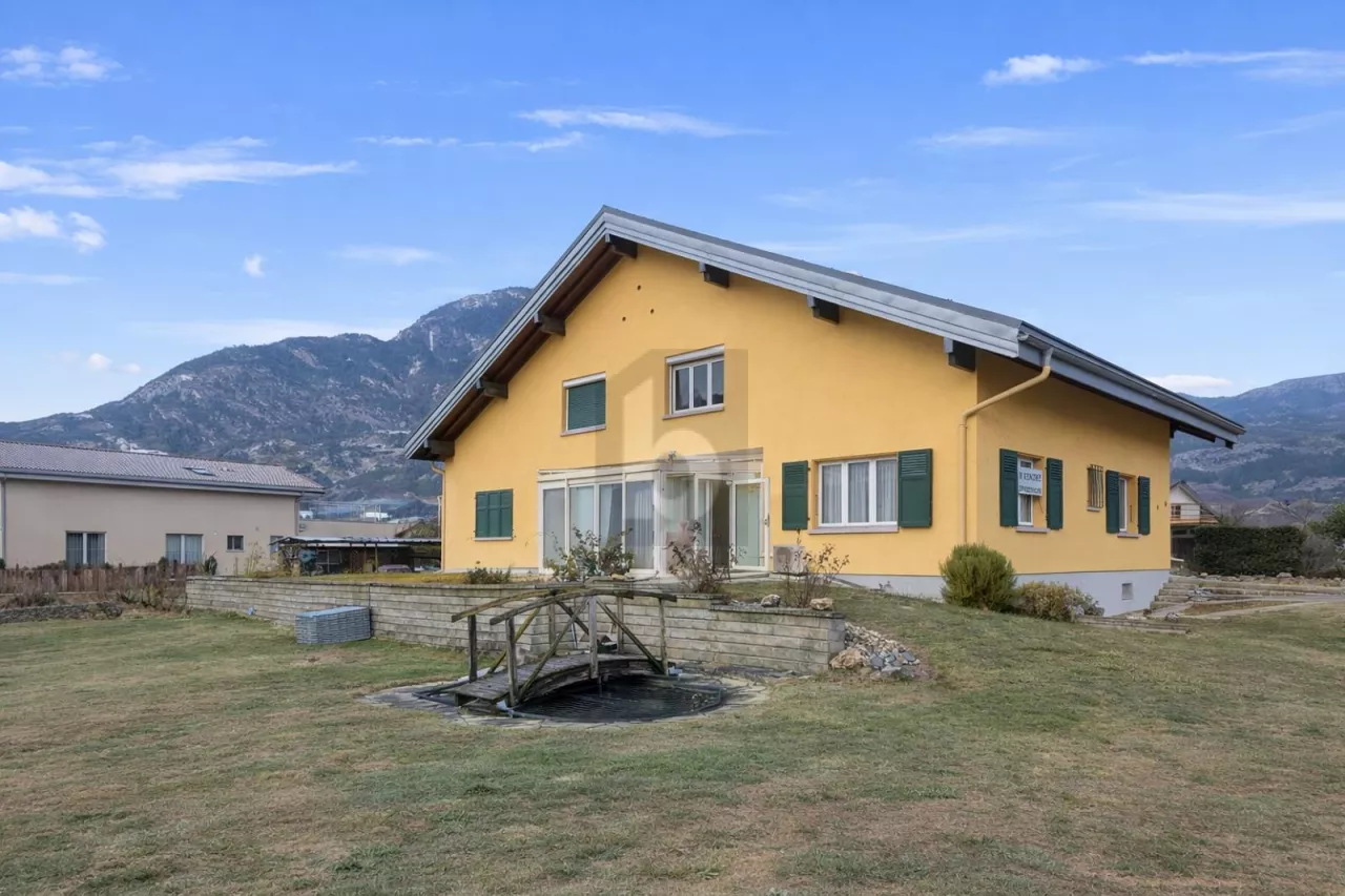 PLAIN-PIED AVEC VÉRANDA ET TERRAIN