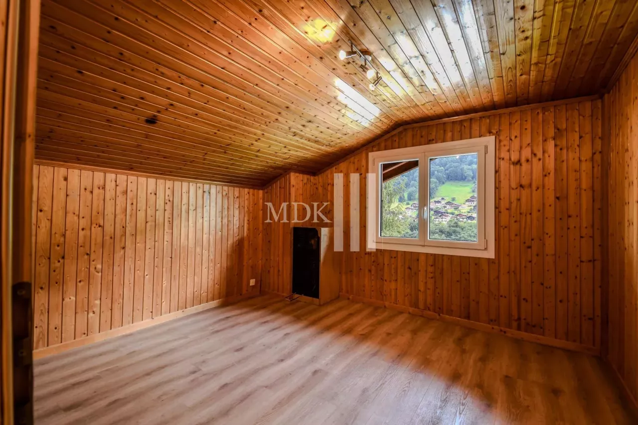 Charmant chalet sur 3 niveaux avec garage
