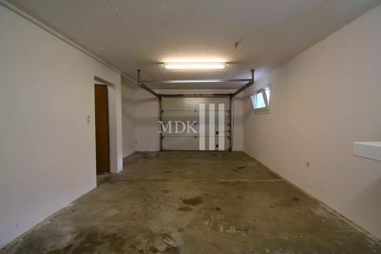Charmant chalet sur 3 niveaux avec garage