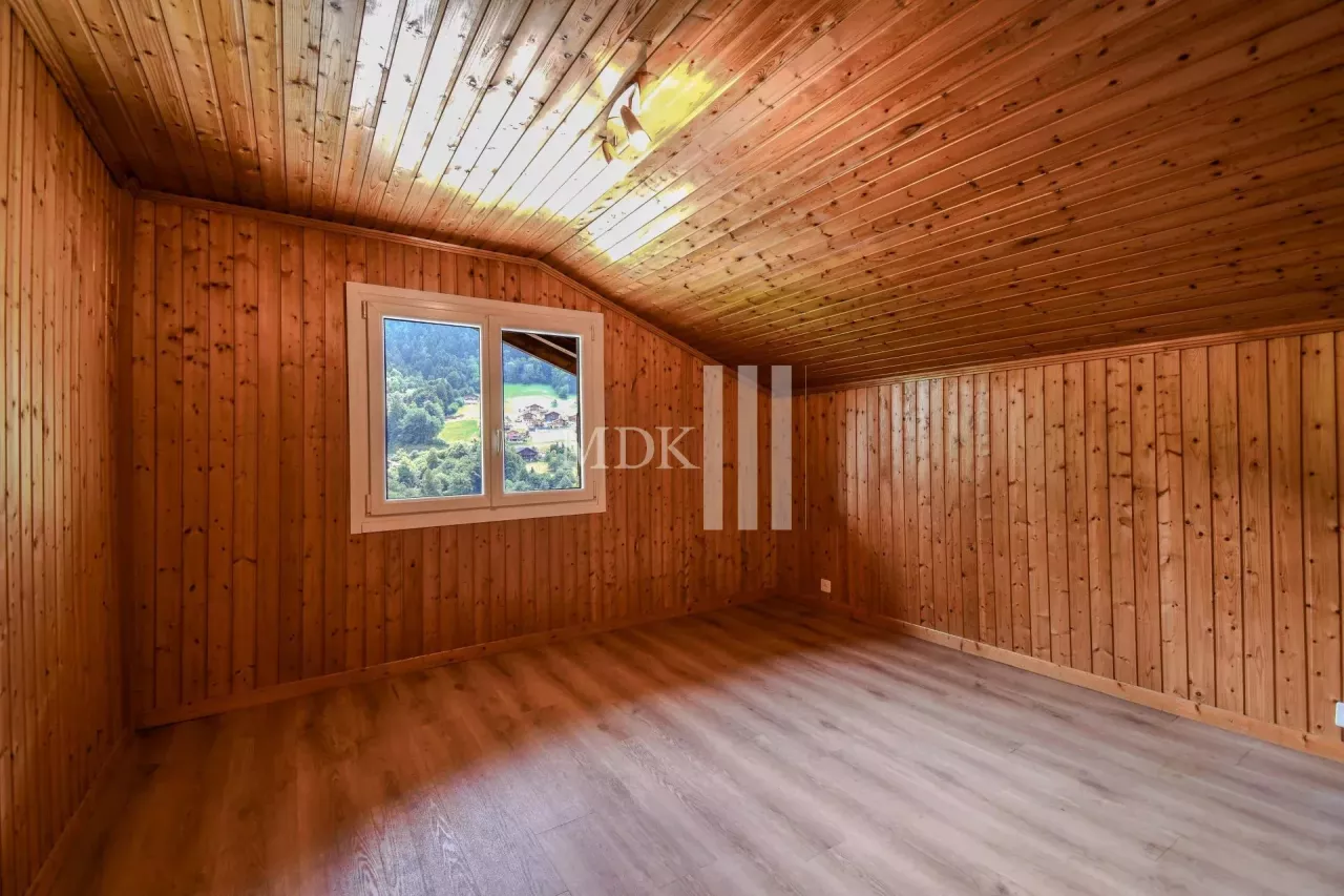 Charmant chalet sur 3 niveaux avec garage