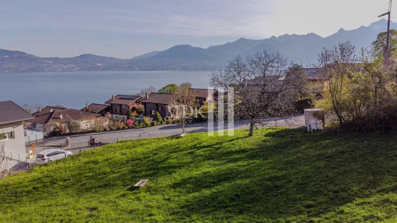 Idéal pour promoteur : terrain avec vue sur le lac et les montagnes